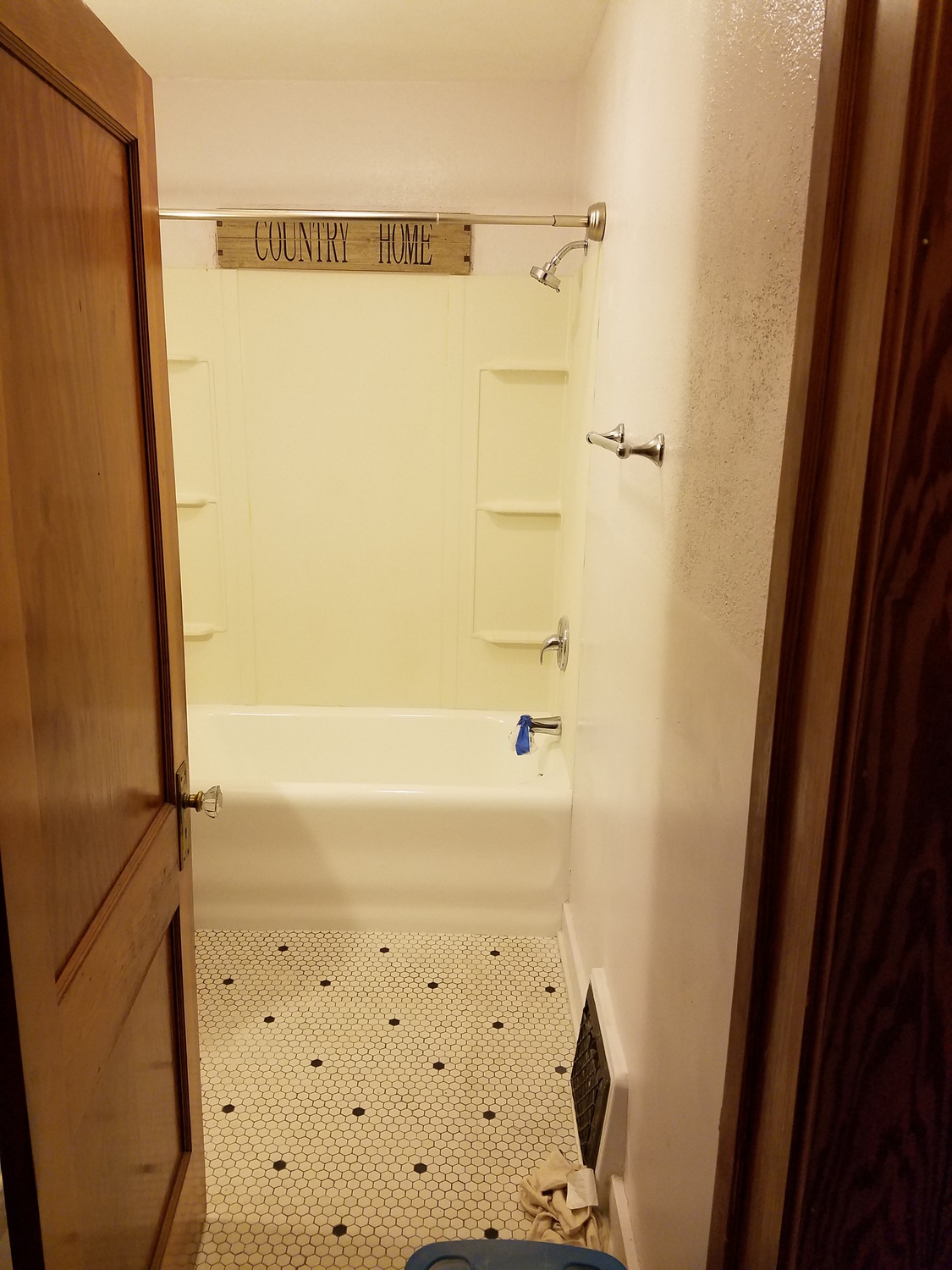 A restored 1920's cast iron porcelain bathtub that was repaired and refinished