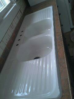Repaired and resurfaced fully restoring this antique farm sink to a factory new look